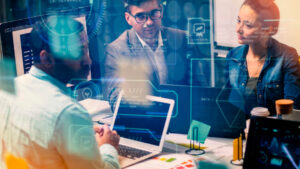 Team of data science professionals surrounded by overlaid technological elements